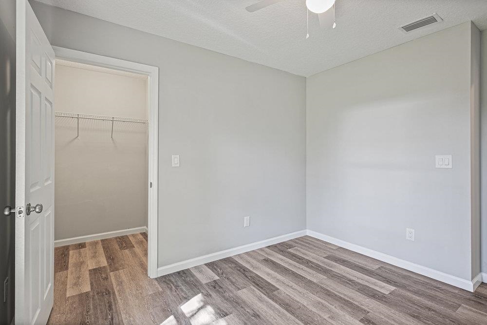 2885 North 8th Street St. Augustine, FL 32084 - Photo 23 of 35 a view of room with wooden floor