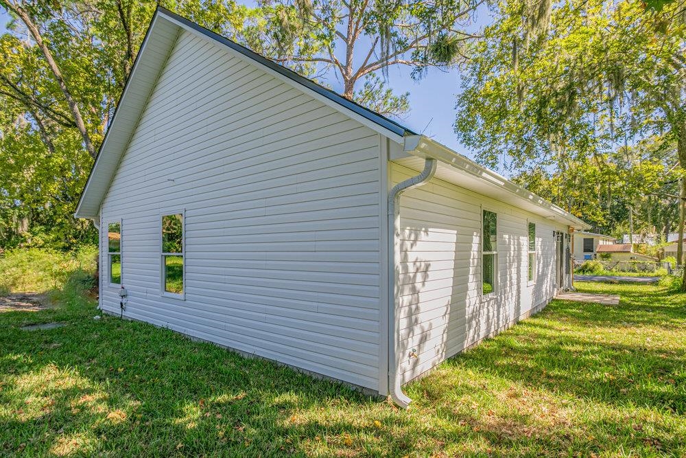 2885 North 8th Street St. Augustine, FL 32084 - Photo 30 of 35 a view of a house with a yard