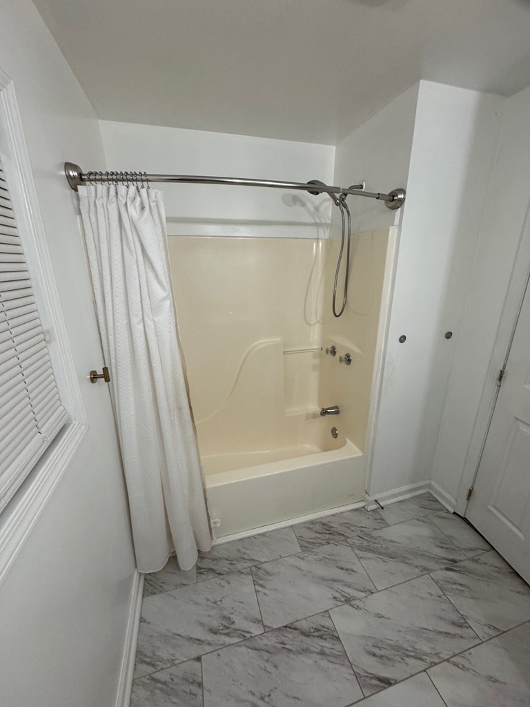 950 Ballewtown Road Blue Ridge, GA 30513 - Photo 10 of 12 a bathroom with a shower and a tub
