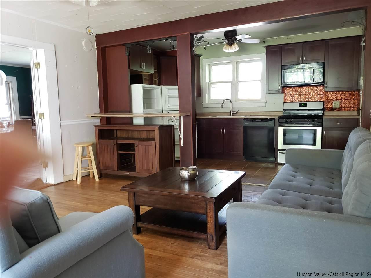 518 Old Rte 23 Cairo, NY 12405 - Photo 3 of 22 a living room with furniture and a fireplace