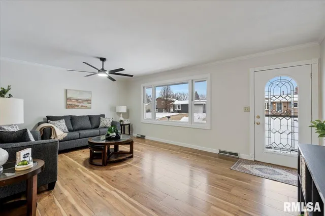a living room with furniture and window