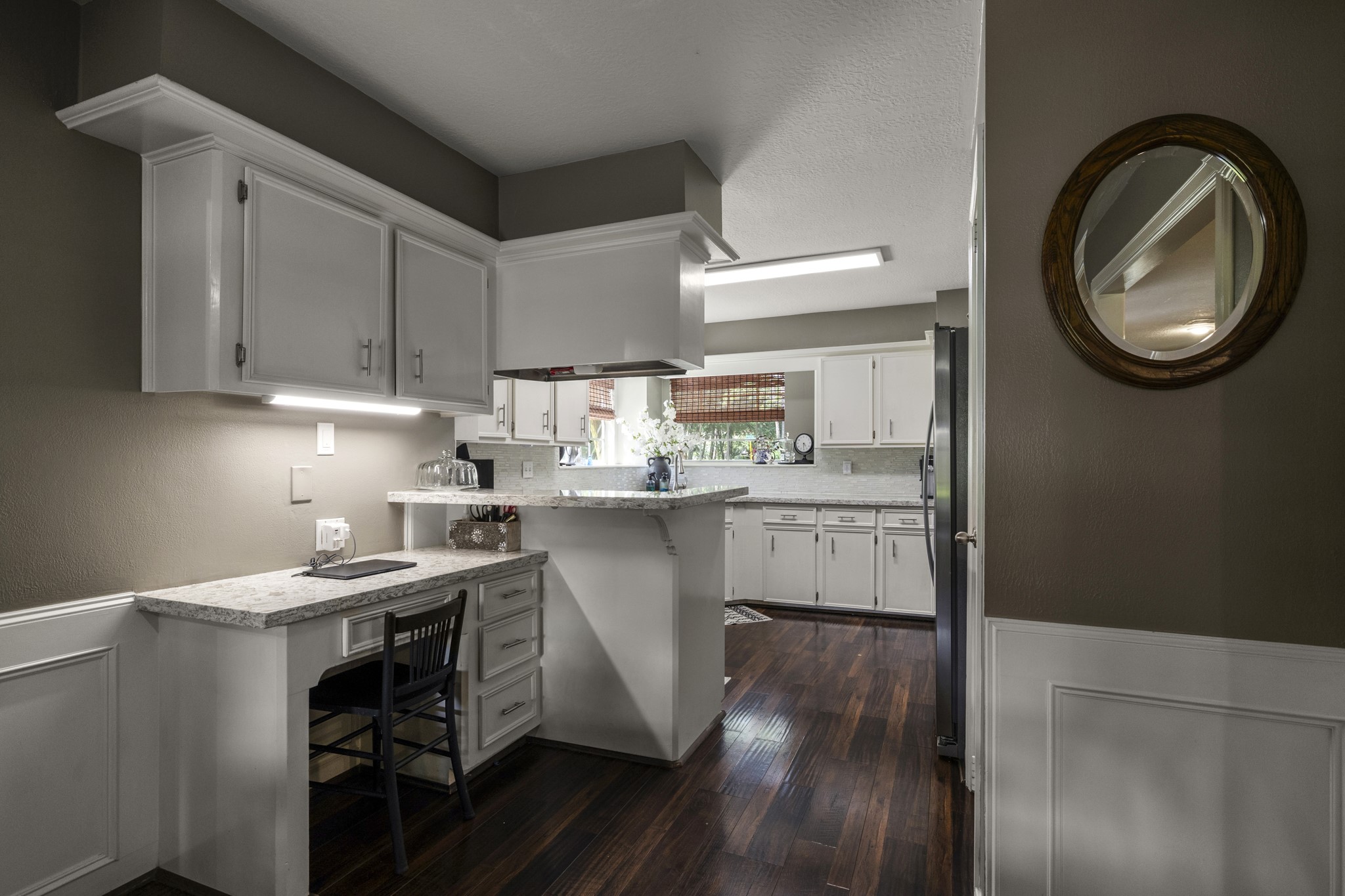 17627 Forest Mist Drive Spring, TX 77379 - Photo 12 of 32 There's a small office space on your way to the kitchen.