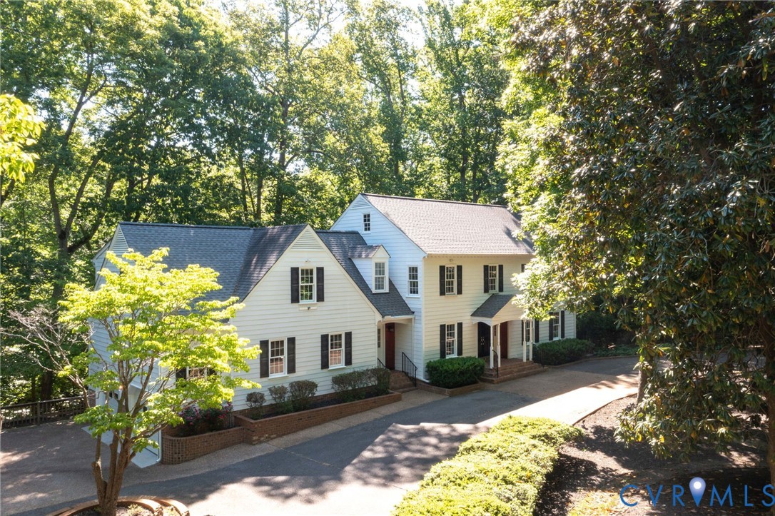 3201 East Brigstock Road Midlothian, VA 23113 - Photo 64 of 72 a front view of a house with garden