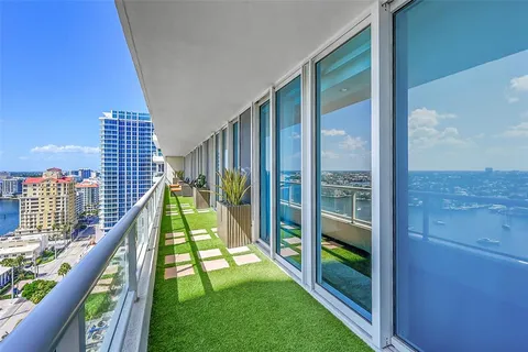 a view of swimming pool from a balcony