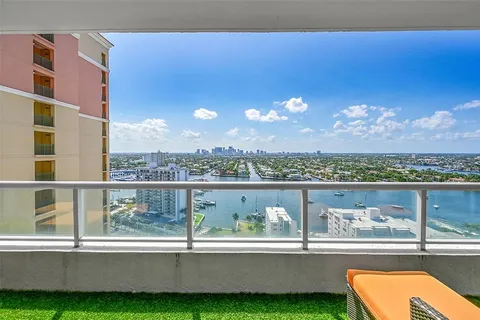 a view of a lake from a balcony