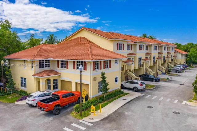 a front view of a house with outdoor space