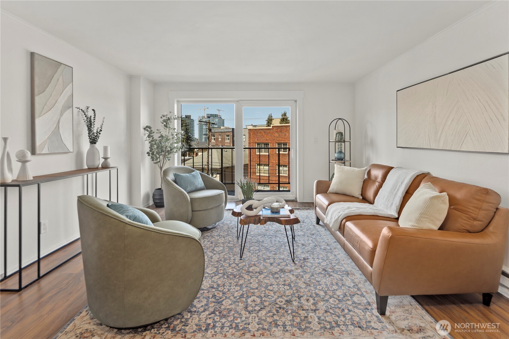 1300 University Street, Unit 2G Seattle, WA 98101 - Photo 1 of 28 a living room with furniture and a wooden floor