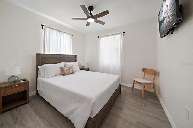 a bathroom with a sink a toilet and window