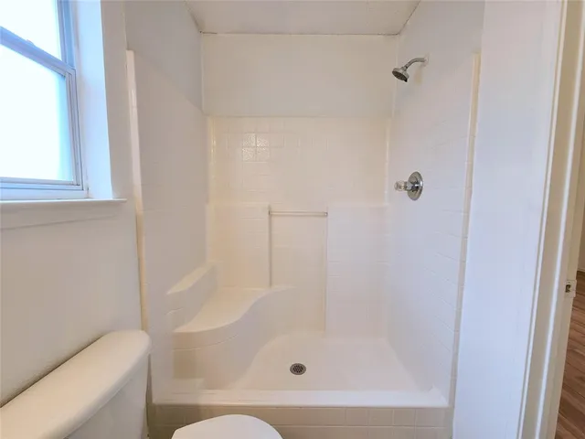 a bathroom with a sink vanity and mirror