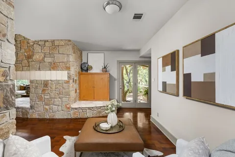 a living room with furniture and window