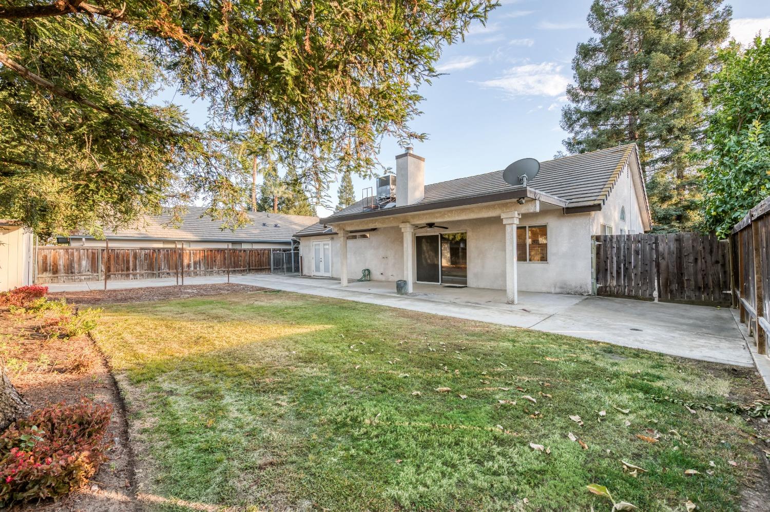 2365 Fallbrook Avenue Clovis, CA 93611 - Photo 33 of 42 a front view of a house with garden