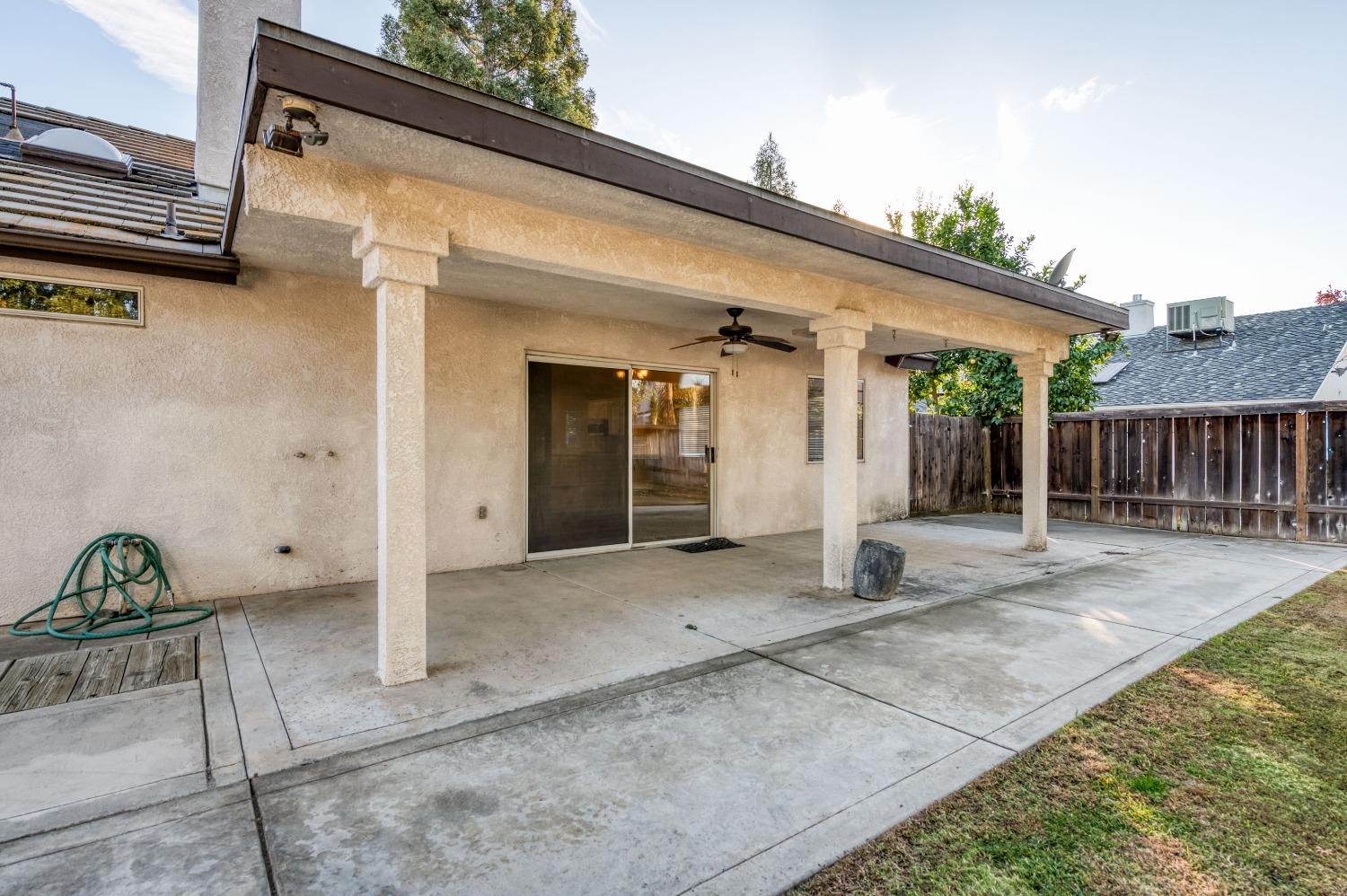 2365 Fallbrook Avenue Clovis, CA 93611 - Photo 37 of 42 a view of a house with backyard and sitting area