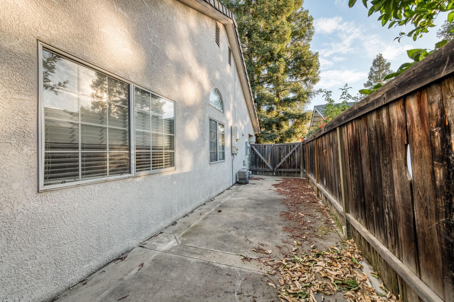2365 Fallbrook Avenue Clovis, CA 93611 - Photo 42 of 42 a view of a backyard with wooden fence