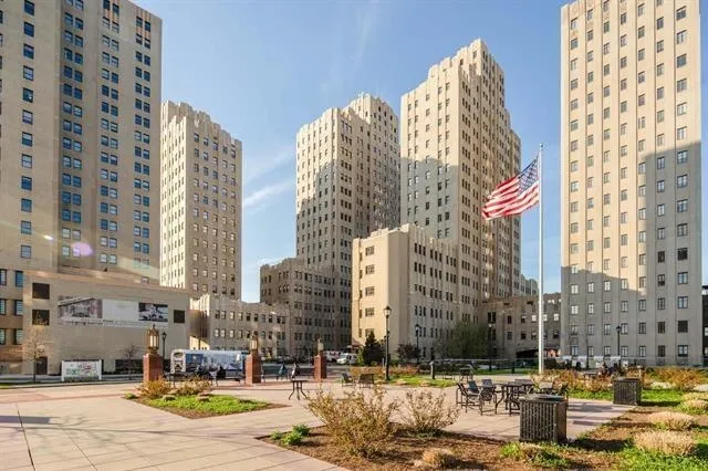 a view of a city with tall buildings