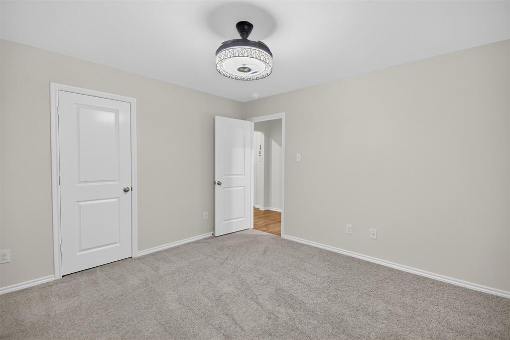 827 Rustic Way Royse City, TX 75189 - Photo 12 of 32 a view of an empty room