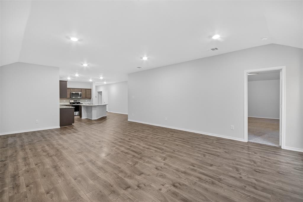 827 Rustic Way Royse City, TX 75189 - Photo 26 of 32 a view of kitchen cabinet and microwave