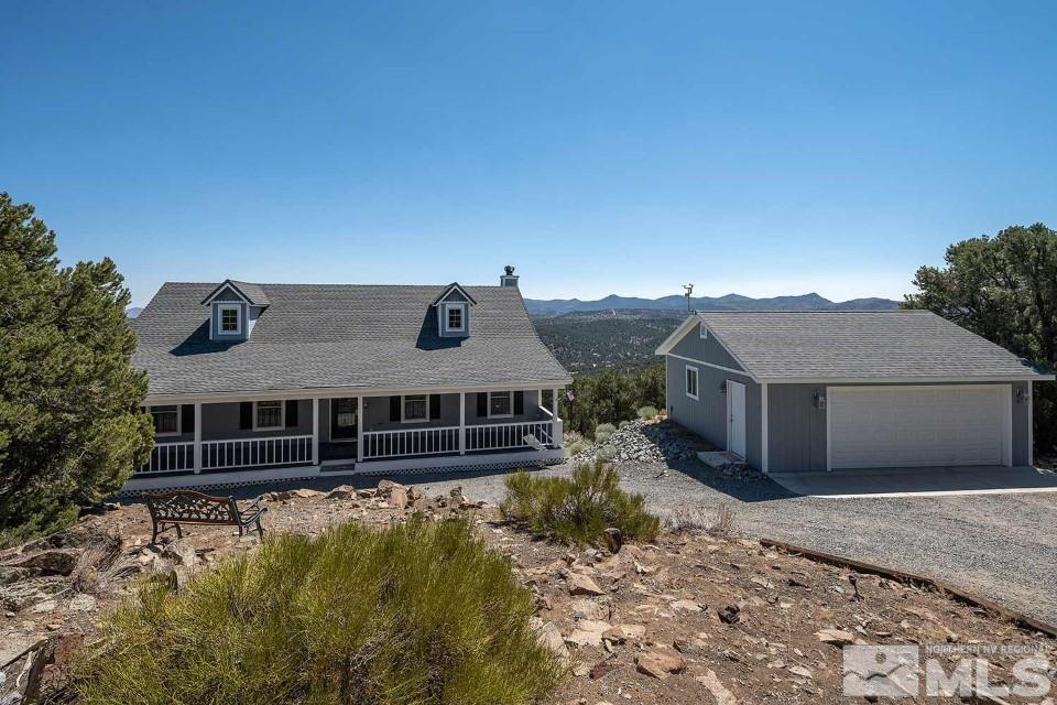 2035 Applegate Road Reno, NV 89521 - Photo 2 of 40 a front view of a house with a yard