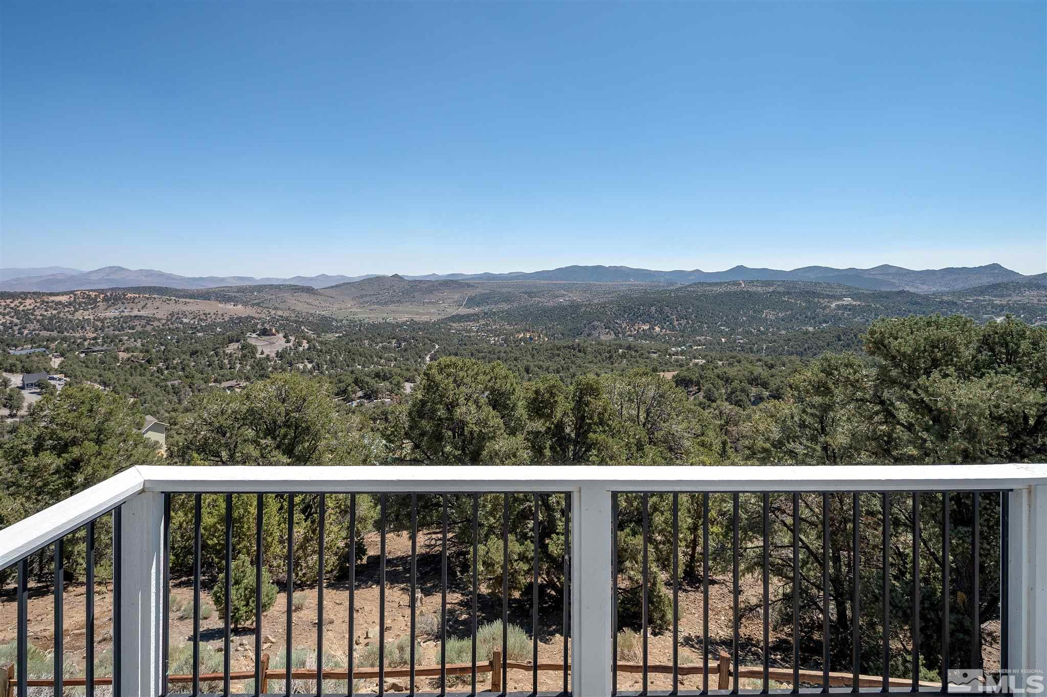 2035 Applegate Road Reno, NV 89521 - Photo 27 of 40 a view of a mountain from a balcony