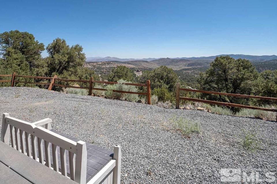 2035 Applegate Road Reno, NV 89521 - Photo 36 of 40 a view of a dry yard with wooden fence