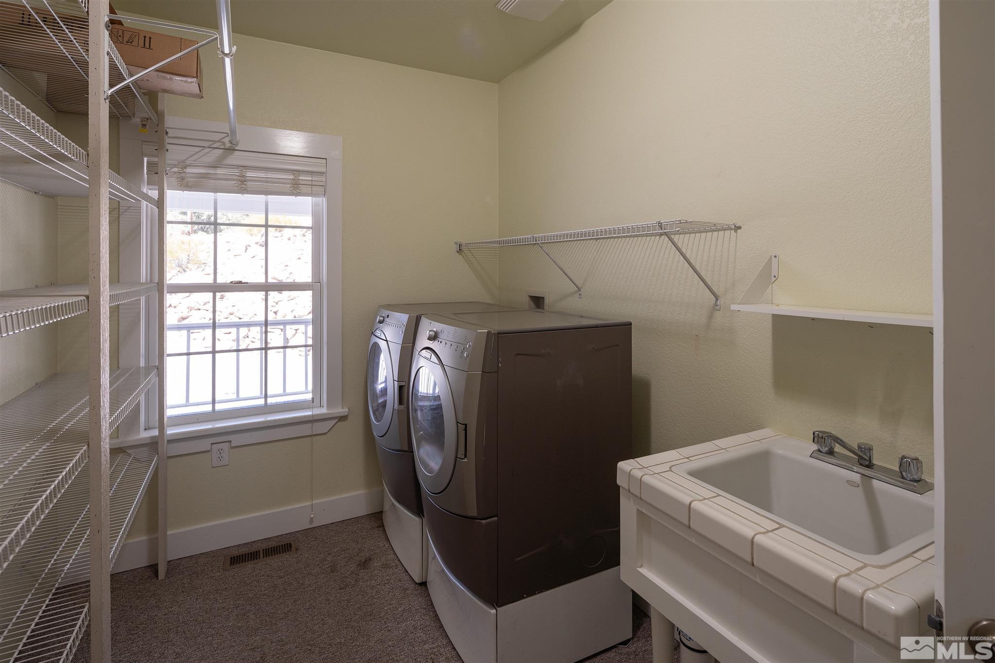 2035 Applegate Road Reno, NV 89521 - Photo 38 of 40 a utility room with dryer and washer