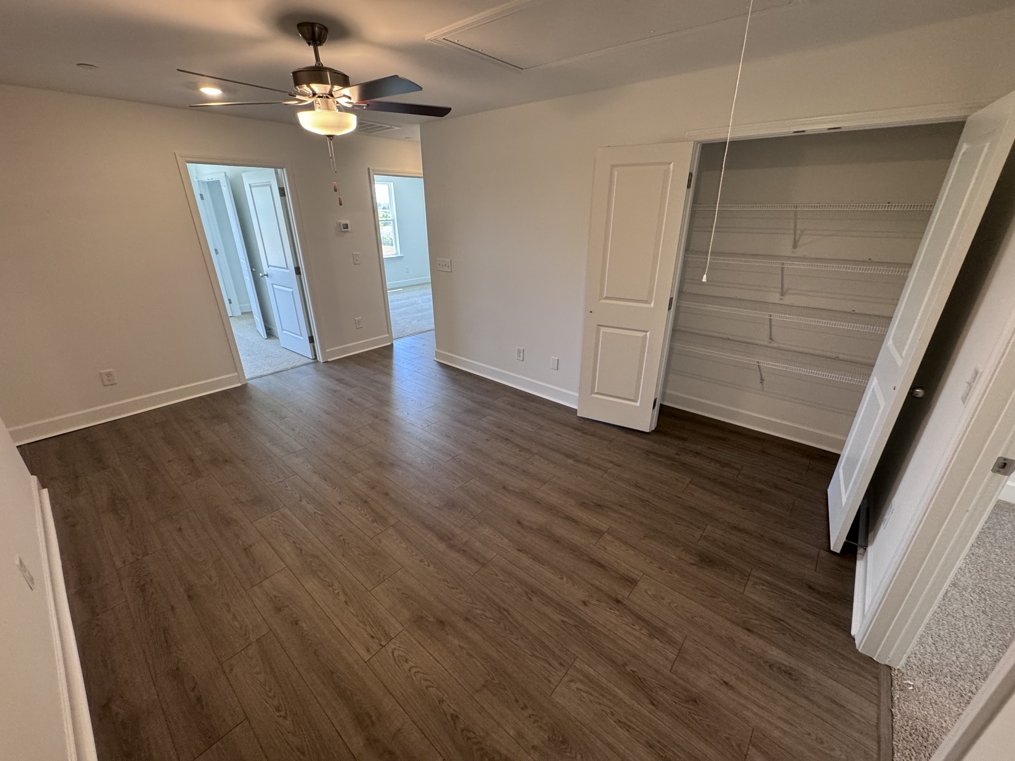 1095 June Wilde Ridge Spring Hill, TN 37174 - Photo 21 of 33 wooden floor in an empty room with a window