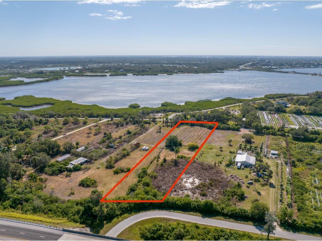 282 Terra Ceia Road Terra Ceia, FL 34250 - Photo 2 of 9 an aerial view of residential building and lake