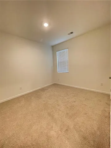 an empty room with a natural light