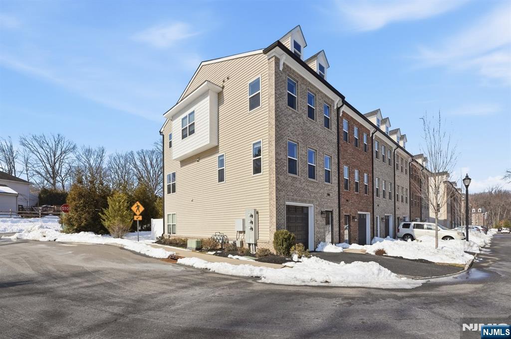 905 Abbe Road Little Falls, NJ 07424 - Photo 24 of 26 a view of a building with a street
