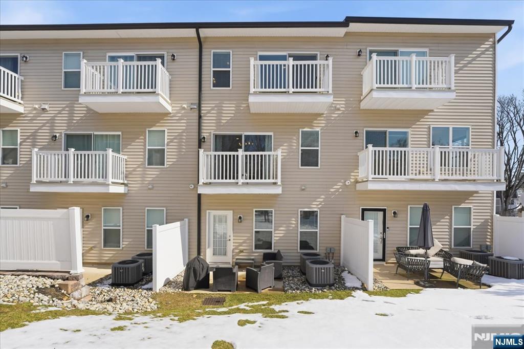 905 Abbe Road Little Falls, NJ 07424 - Photo 25 of 26 a front view of a building with street view