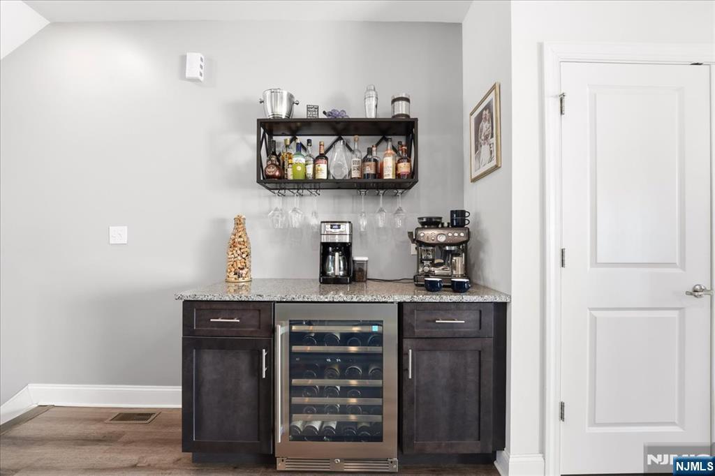 905 Abbe Road Little Falls, NJ 07424 - Photo 5 of 26 a kitchen with a sink and cabinets