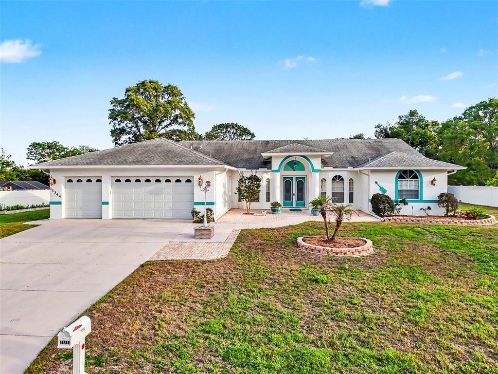 11344 Rainbow Woods Loop Spring Hill, FL 34609 - Photo 2 of 100
