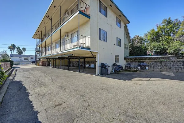 a view of a building with a bench