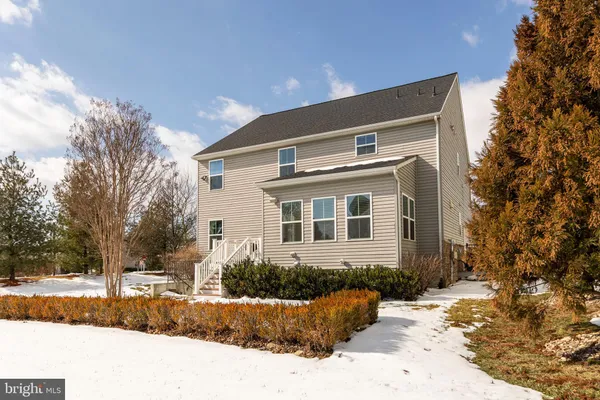 a aerial view of a house with a swimming pool