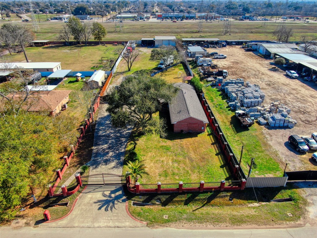 13117 Player Street Houston, TX 77045 - Photo 26 of 36 a view of a lake with a house