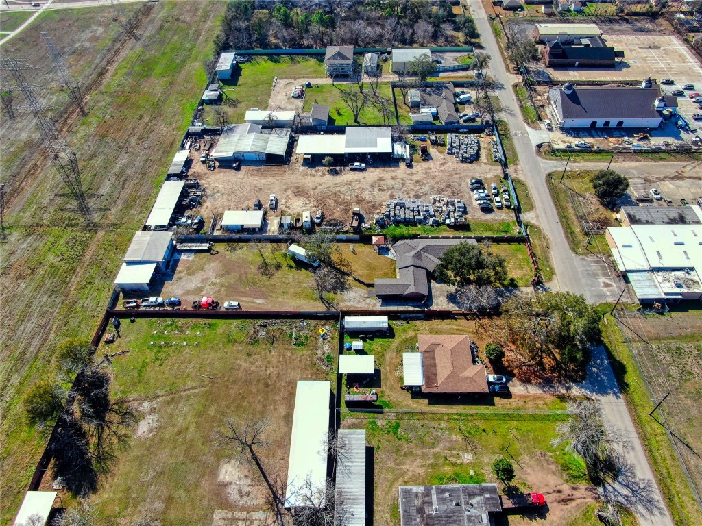 13117 Player Street Houston, TX 77045 - Photo 30 of 36 an aerial view of a house with a garden lake view