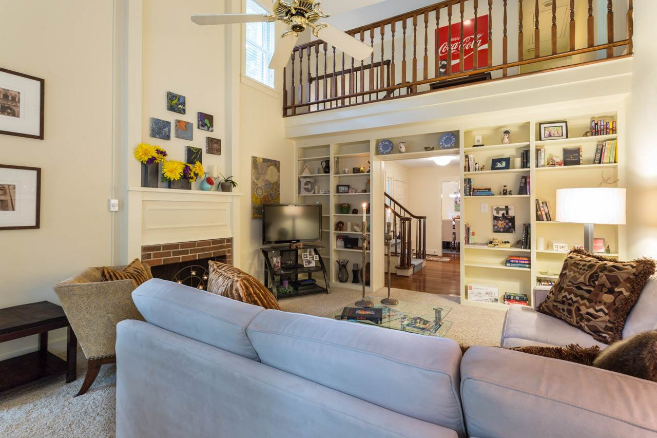 1723 Falls Church Road Raleigh, NC 27609 - Photo 5 of 25 Living Room with Built-in Bookshelves