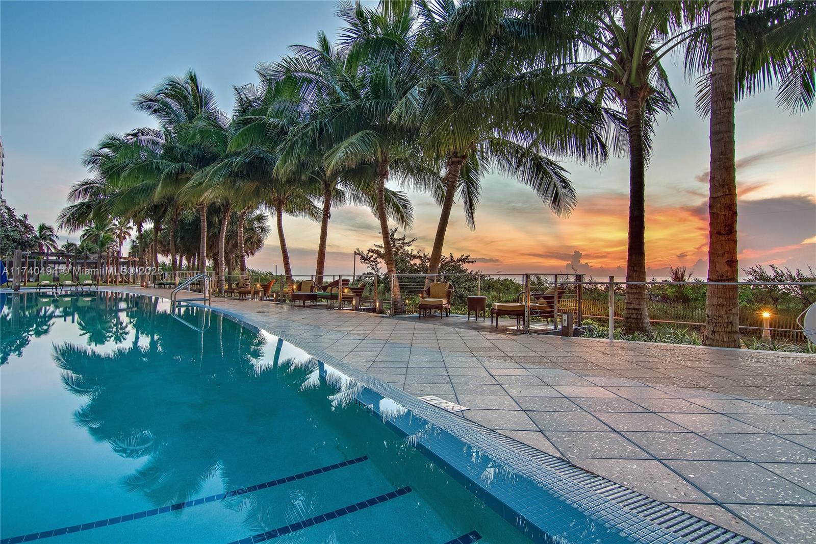 6801 Collins Avenue, Unit 608 Miami Beach, FL 33141 - Photo 16 of 24 a view of an outdoor space and swimming pool