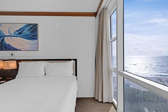 a bathroom with a sink a mirror and a shower