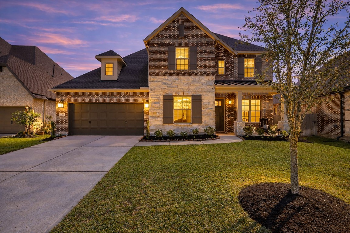 32442 Soaring Willow Way Conroe, TX 77385 - Photo 45 of 45 a front view of a house with a yard