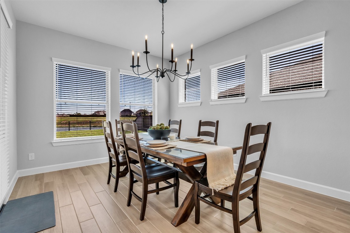 32442 Soaring Willow Way Conroe, TX 77385 - Photo 11 of 45 a view of a dining room with furniture window and outside view