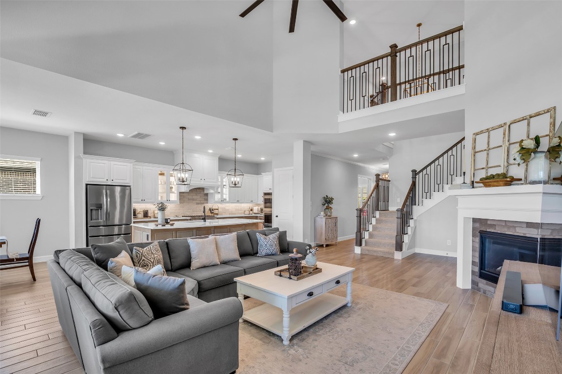 32442 Soaring Willow Way Conroe, TX 77385 - Photo 14 of 45 a living room with furniture or fireplace and a wooden floor