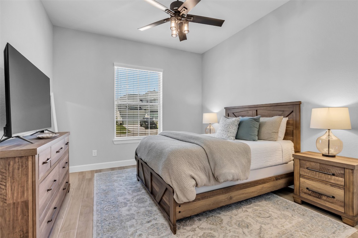 32442 Soaring Willow Way Conroe, TX 77385 - Photo 23 of 45 Spacious secondary bedroom downstairs is perfect for guests or multi-generational living.
