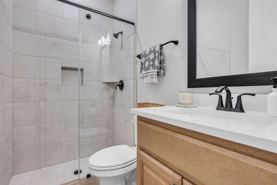32442 Soaring Willow Way Conroe, TX 77385 - Photo 24 of 45 a bathroom with a sink toilet and shower