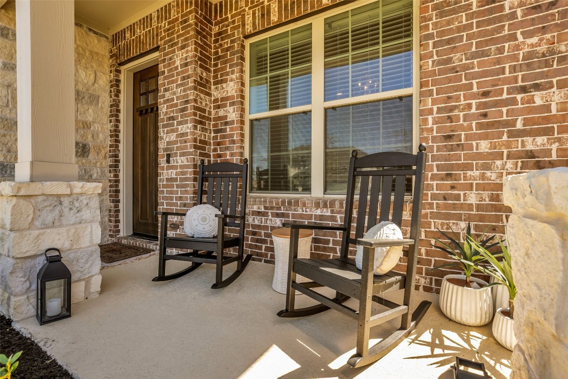 32442 Soaring Willow Way Conroe, TX 77385 - Photo 2 of 45 a balcony with table and chairs