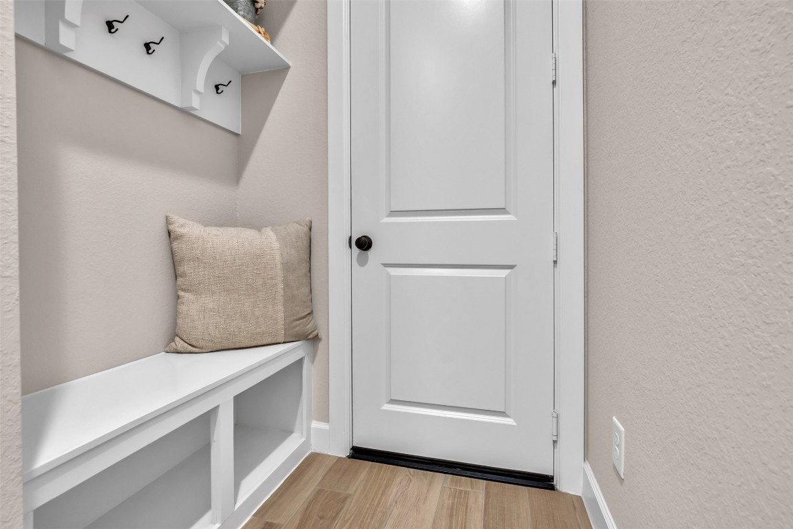 32442 Soaring Willow Way Conroe, TX 77385 - Photo 32 of 45 Functional mud area with built-in bench and hooks—perfect for keeping everyday essentials organized.