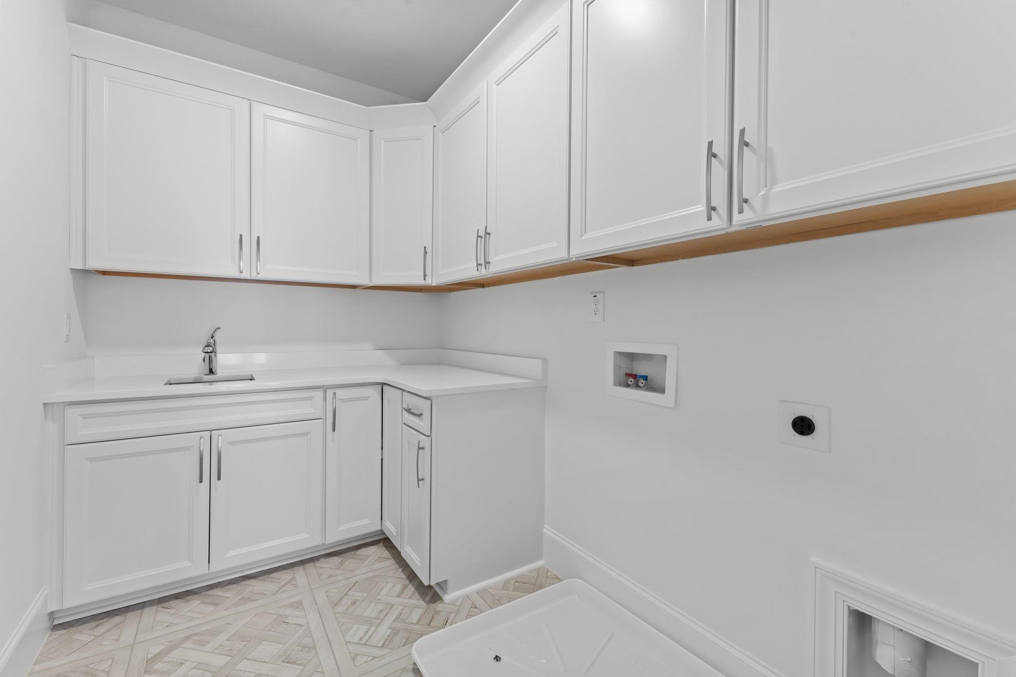 9312 Field Maple Court Raleigh, NC 27613 - Photo 38 of 49 Laundry room on 2nd floor