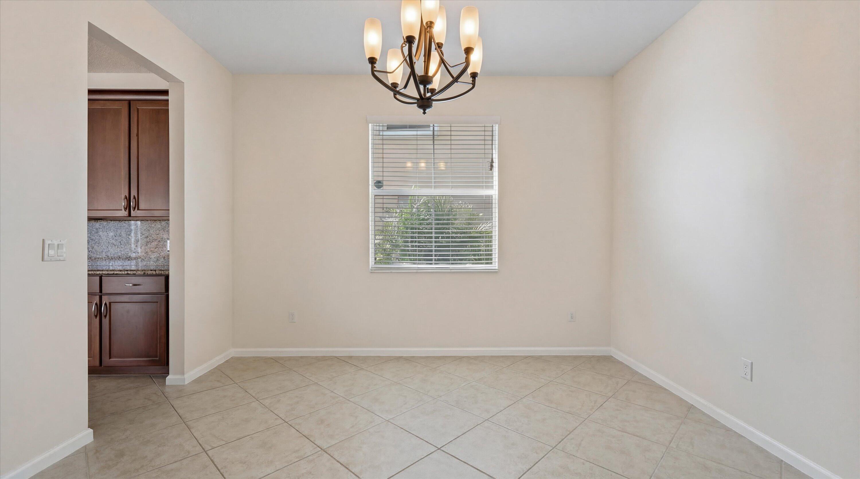 3072 Payson Way Wellington, FL 33414 - Photo 11 of 43 an empty room with a window