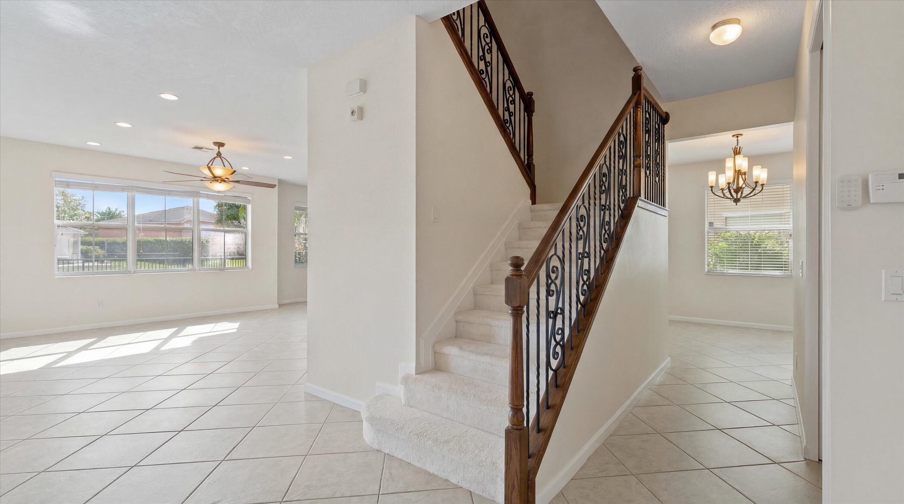 3072 Payson Way Wellington, FL 33414 - Photo 13 of 43 a view of an entryway with wooden floor