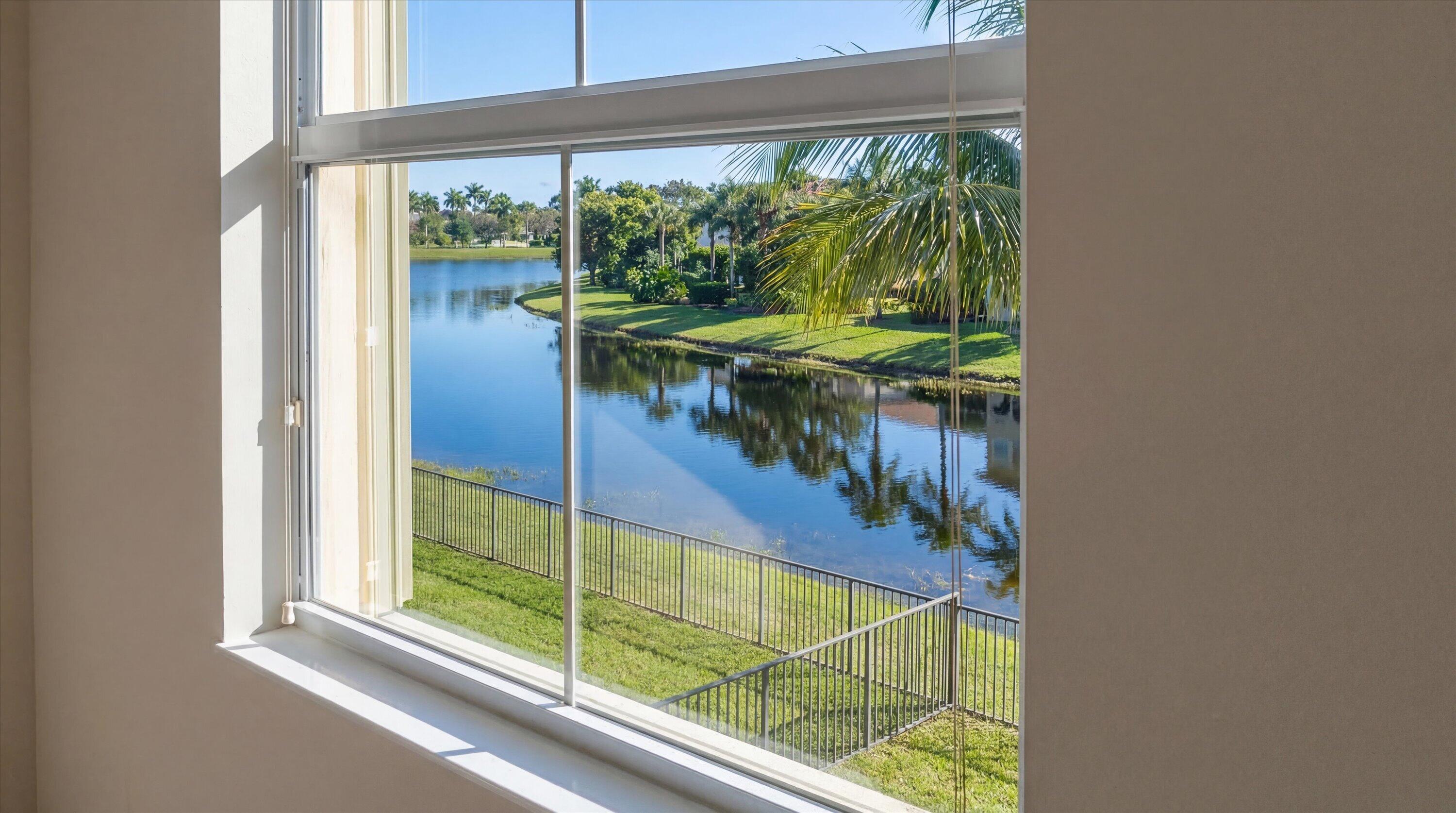 3072 Payson Way Wellington, FL 33414 - Photo 16 of 43 a view of swimming pool from a window