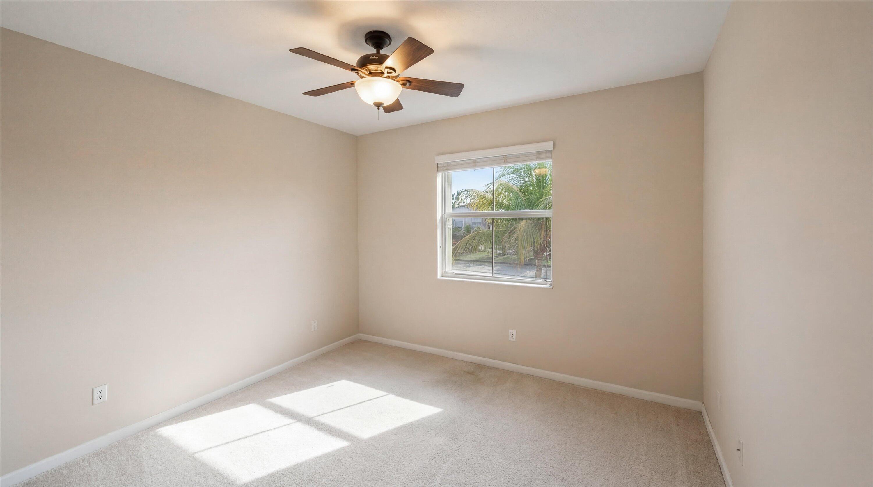 3072 Payson Way Wellington, FL 33414 - Photo 26 of 43 an empty room with a window